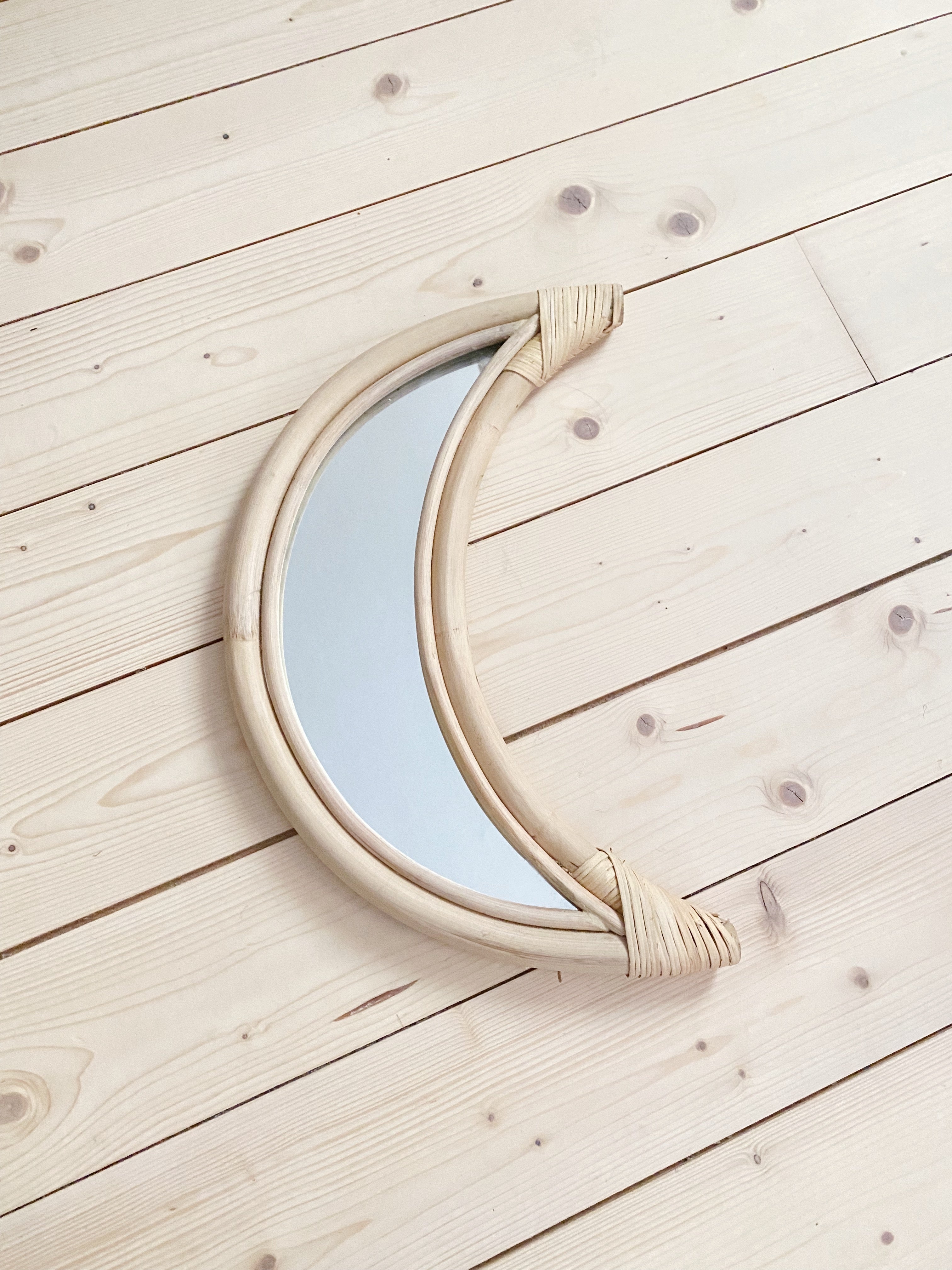 Rattan Moon Mirror the stories